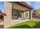 Covered patio leads to artificial lawn with nice yard at 17736 W Cassia Way, Goodyear, AZ 85338