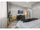 Comfortable bedroom with neutral tones, modern decor, and ample natural light creates a cozy and inviting space at 18970 W Desert Hills Dr, Surprise, AZ 85388