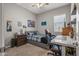 bedroom featuring decor, a comfortable bed, and a dedicated study area at 18970 W Desert Hills Dr, Surprise, AZ 85388
