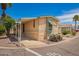 Inviting home with covered parking, manicured landscaping, and easy access at 201 S Greenfield Rd # 129, Mesa, AZ 85206