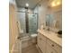 Updated bathroom features glass shower door, white vanity, and modern fixtures at 20100 N 78Th Pl # 3084, Scottsdale, AZ 85255