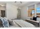Bright bedroom featuring a modern interior with a large window offering natural light and comfortable bench seating at 20100 N 78Th Pl # 3084, Scottsdale, AZ 85255