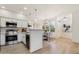Charming kitchen with stainless appliances, white cabinets and open to a breakfast nook and the home's entry at 20100 N 78Th Pl # 3084, Scottsdale, AZ 85255