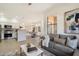 Living room open to kitchen features stylish decor, comfortable seating, and lots of natural light at 20100 N 78Th Pl # 3084, Scottsdale, AZ 85255