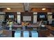 Spacious lounge area with modern furnishings, including comfortable sofas and large screen televisions, providing a luxurious ambiance at 20100 N 78Th Pl # 3084, Scottsdale, AZ 85255