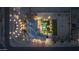 Stunning aerial shot of the estate at night, illuminated landscaping, and beautiful pool area at 20213 W Amelia Ave, Buckeye, AZ 85396