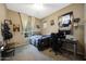 Bedroom featuring carpet, ceiling fan and decor with a sports theme at 20959 W Western Dr, Buckeye, AZ 85396