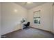 Bedroom featuring carpet, a desk and a window with natural light at 20959 W Western Dr, Buckeye, AZ 85396