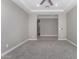 Bright and airy carpeted bedroom featuring recessed lighting and open doorway at 22386 N Daniel Dr, Maricopa, AZ 85138