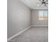 Spacious carpeted bedroom with recessed lighting and a window providing ample natural light at 22386 N Daniel Dr, Maricopa, AZ 85138