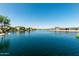 Wide canal with homes lining the waterfront, providing a scenic and desirable residential environment at 22386 N Daniel Dr, Maricopa, AZ 85138