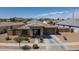 Single-story home in a desert community with mountain views, and tidy landscaping at 22601 E Via Las Brisas --, Queen Creek, AZ 85142