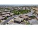 Expansive aerial view showcasing a well-planned community with lush green spaces and neatly arranged homes at 22601 E Via Las Brisas --, Queen Creek, AZ 85142