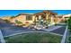 A well-maintained backyard featuring a charming pergola, lush greenery, and a patio area perfect for outdoor dining and relaxation at 22601 E Via Las Brisas --, Queen Creek, AZ 85142