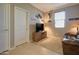 Home theater room features a cozy seating area with a flat-screen TV and decor at 22601 E Via Las Brisas --, Queen Creek, AZ 85142