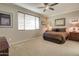 Cozy bedroom with carpet, fan, and natural light at 22601 E Via Las Brisas --, Queen Creek, AZ 85142