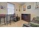 Multi-purpose bedroom features a desk, chair, and entertainment unit at 22601 E Via Las Brisas --, Queen Creek, AZ 85142