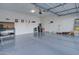 Wide garage with epoxy floors and plenty of space for storage at 22601 E Via Las Brisas --, Queen Creek, AZ 85142