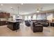Open-concept living space featuring a kitchen island, dining area, and a spacious living room at 22601 E Via Las Brisas --, Queen Creek, AZ 85142