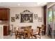 Cozy dining area featuring elegant decor, perfect for hosting intimate meals and gatherings at 26270 W Horsham Ct, Buckeye, AZ 85396