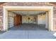 Spacious garage with built-in cabinets and shelving, offering plenty of storage solutions at 26270 W Horsham Ct, Buckeye, AZ 85396