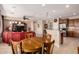 Open-concept living space with seamless flow between the living room and kitchen area, great for entertaining at 26270 W Horsham Ct, Buckeye, AZ 85396