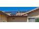 An up close roof view highlighting the roof and the solar panels on the roof at 26270 W Horsham Ct, Buckeye, AZ 85396
