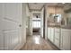 Bathroom with granite countertops and a walk-in shower at 26421 W Zachary Dr, Buckeye, AZ 85396