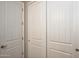The closet features three white doors at 26421 W Zachary Dr, Buckeye, AZ 85396