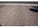 Paver driveway and walkway with a desert landscape, perfect for low maintenance living at 26421 W Zachary Dr, Buckeye, AZ 85396