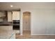 Bright kitchen with stainless steel appliances and light countertops at 26421 W Zachary Dr, Buckeye, AZ 85396