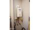 Rinnai tankless water heater installed on the wall, offering energy-efficient hot water at 26421 W Zachary Dr, Buckeye, AZ 85396