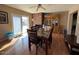 Bright dining area featuring natural light, a modern table, and seamless access to the backyard at 2729 W Keim Dr, Phoenix, AZ 85017
