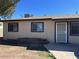 Charming single-story home featuring barred windows and a secure front entrance, perfect for peace of mind at 2729 W Keim Dr, Phoenix, AZ 85017