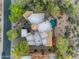 Stunning aerial view of the property showcasing the tile roof, pool, and desert landscape at 29308 N 108Th N Pl, Scottsdale, AZ 85262