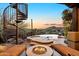 Private backyard with fire pit, hot tub, pool, and outdoor lounge chairs at 29308 N 108Th N Pl, Scottsdale, AZ 85262