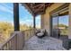 Relaxing balcony with comfortable seating and stunning views of the surrounding landscape at 29308 N 108Th N Pl, Scottsdale, AZ 85262