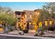 Stunning two-story home showcasing desert landscaping and architectural design at twilight at 29308 N 108Th N Pl, Scottsdale, AZ 85262