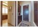 Inviting hallway with beautiful tile flooring leading to the gourmet kitchen at 29308 N 108Th N Pl, Scottsdale, AZ 85262