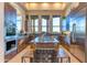 Gourmet kitchen with stainless steel appliances, island, and large windows at 29308 N 108Th N Pl, Scottsdale, AZ 85262