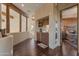 Cozy kitchenette featuring wooden cabinets, granite countertop, microwave, and coffee maker at 29308 N 108Th N Pl, Scottsdale, AZ 85262