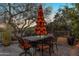 Outdoor patio space with dining table and chairs, with lovely desert views at 29308 N 108Th N Pl, Scottsdale, AZ 85262