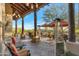 Outdoor patio with beautiful desert view, comfortable seating, and warm heaters at 29308 N 108Th N Pl, Scottsdale, AZ 85262