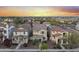 Beautiful neighborhood featuring meticulously maintained homes under a colorful sunset sky at 2941 N Evergreen St, Buckeye, AZ 85396