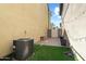 Backyard area is a fenced in and is a mix of paver patio, and artifical turf at 2941 N Evergreen St, Buckeye, AZ 85396