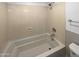 Bathroom featuring a shower over tub and chrome fixtures at 30271 W Crittenden Ln, Buckeye, AZ 85396