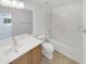 Bright bathroom with tile floors, a tub and shower combination and a single sink vanity at 30271 W Crittenden Ln, Buckeye, AZ 85396