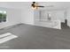 Bright upper room features neutral carpeting, white walls, and a window at 30271 W Crittenden Ln, Buckeye, AZ 85396