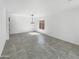 Living room with neutral paint and tile floors at 30271 W Crittenden Ln, Buckeye, AZ 85396