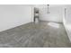 Living room with neutral paint and tile floors at 30271 W Crittenden Ln, Buckeye, AZ 85396